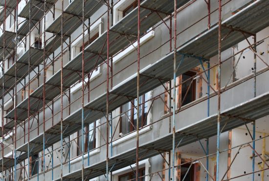 Beautiful shot of metal steel bars and glass windows in the building A beautiful shot of metal steel bars and glass windows in the building