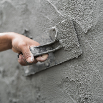 hand-worker-plastering-wet-cement-wall-background-2023-08-19-05-47-52-utc hand-worker-plastering-wet-cement-wall-background-2023-08-19-05-47-52-utc